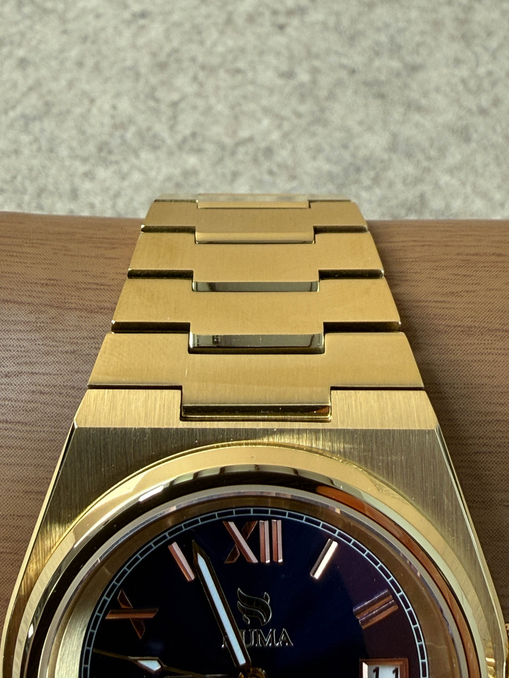 Close-up of NUMA Ruah Regalis watch showing its elegant face, silver strap, and intricate details.