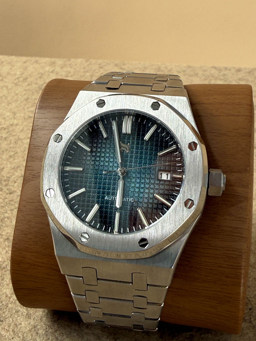 Close-up of the NUMA Abyssus Watch showcasing its sleek design and dark dial, an elegant accessories timepiece.