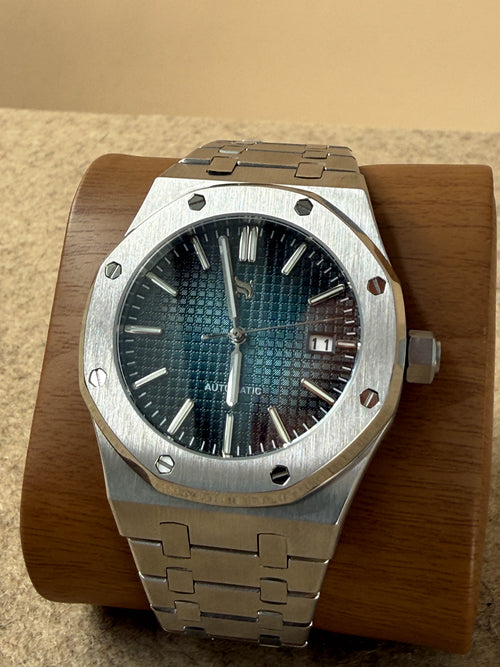 Close-up of the NUMA Abyssus Watch showcasing its sleek design and dark dial, an elegant accessories timepiece.