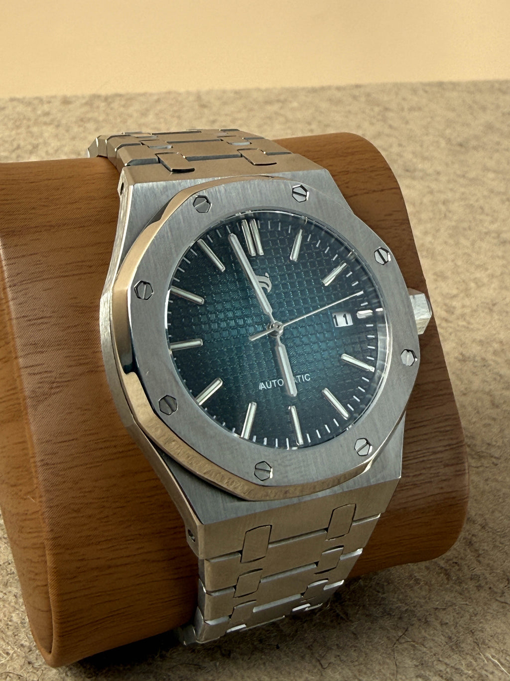 A close-up of the NUMA Abyssus Watch with a sleek black strap and round face, showcasing its stylish accessories design.
