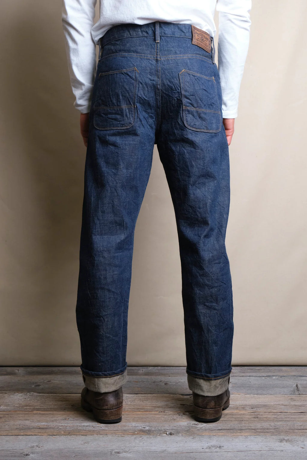Freenote Belford Straight 13 oz rinsed denim jeans displayed on a model, showcasing their fit and classic style.