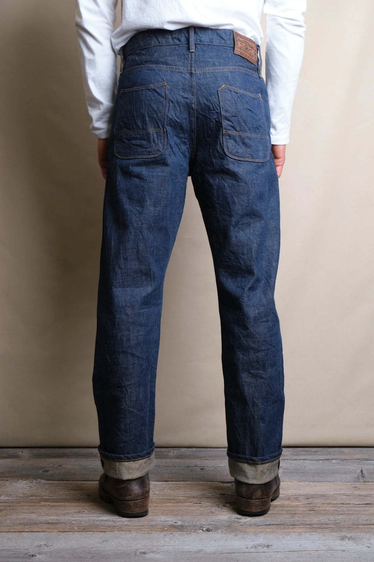 Freenote Belford Straight 13 oz rinsed denim jeans displayed on a model, showcasing their fit and classic style.