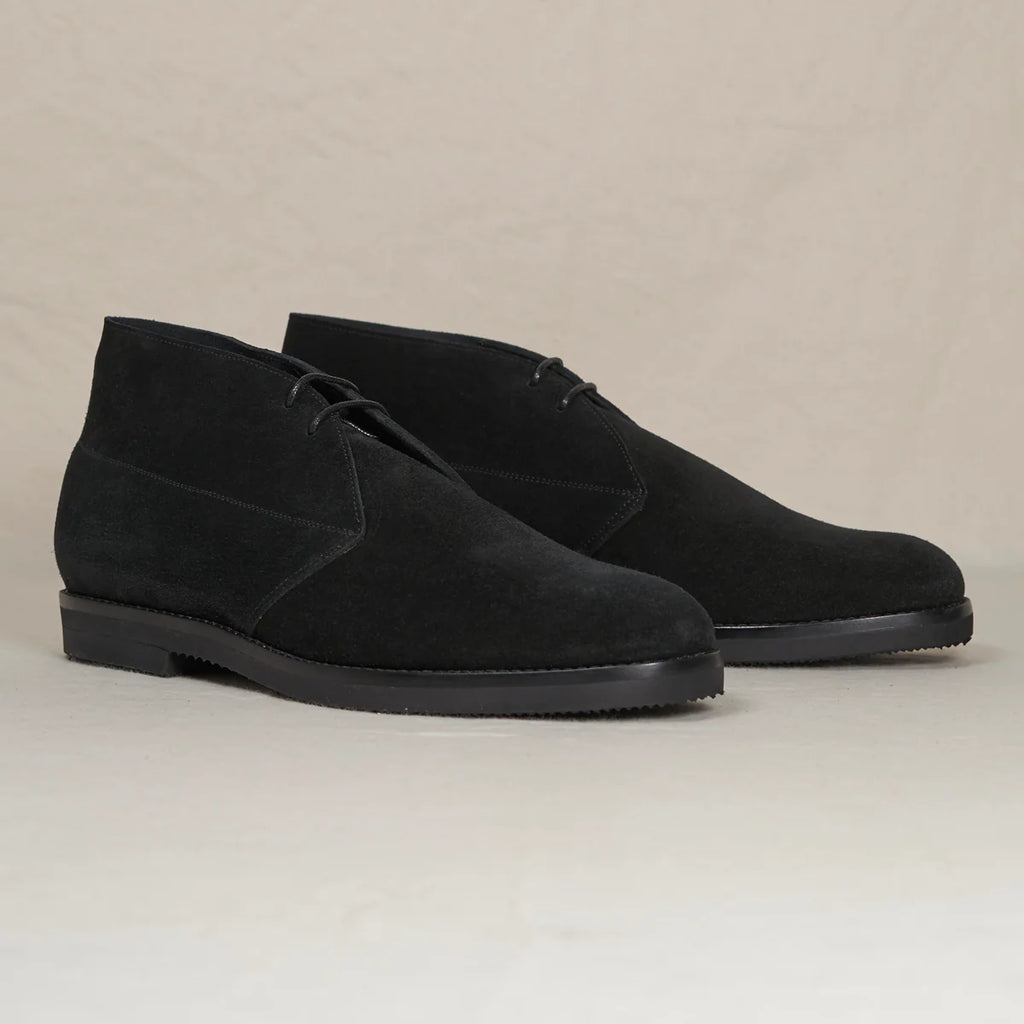 Black suede Voyager Chukka boots by August Special, stylish footwear with a sleek design and durable sole.