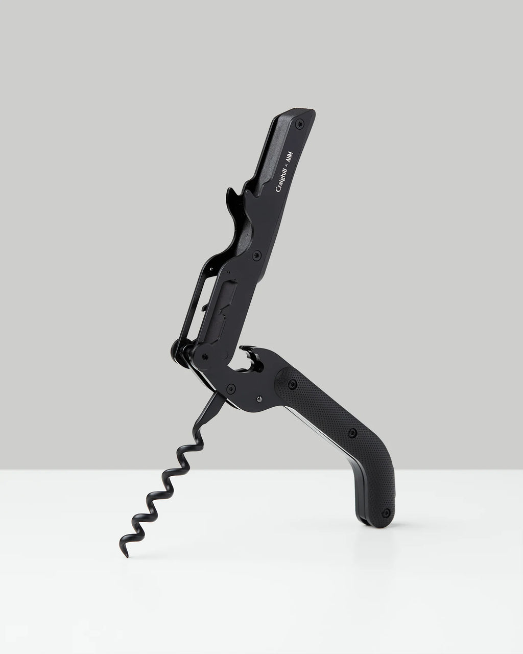 Craighill Best Wine Key Noir accessory featuring a sleek, stainless steel corkscrew and foil cutter for wine opening.