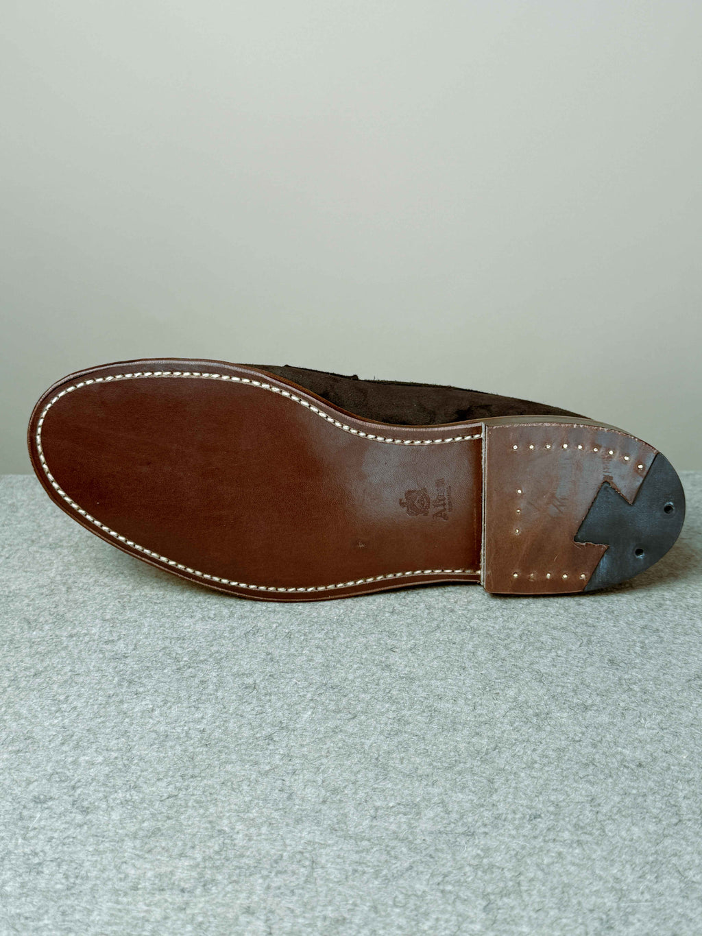 Alden Leisure Penny Loafer in chocolate suede, showcasing classic slip-on footwear with a smooth suede finish and penny strap detail.