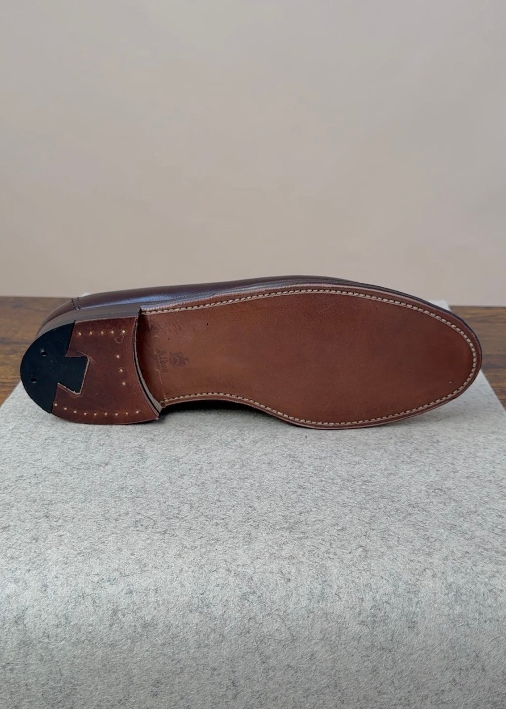 Alden Copley Penny Loafer in dark brown soft calfskin, showcasing classic slip-on footwear with polished leather finish.