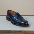 Alden Leisure Handsewn Penny Loafer 986 in Color 8 Shell Cordovan, close-up of classic leather footwear with hand-sewn details.