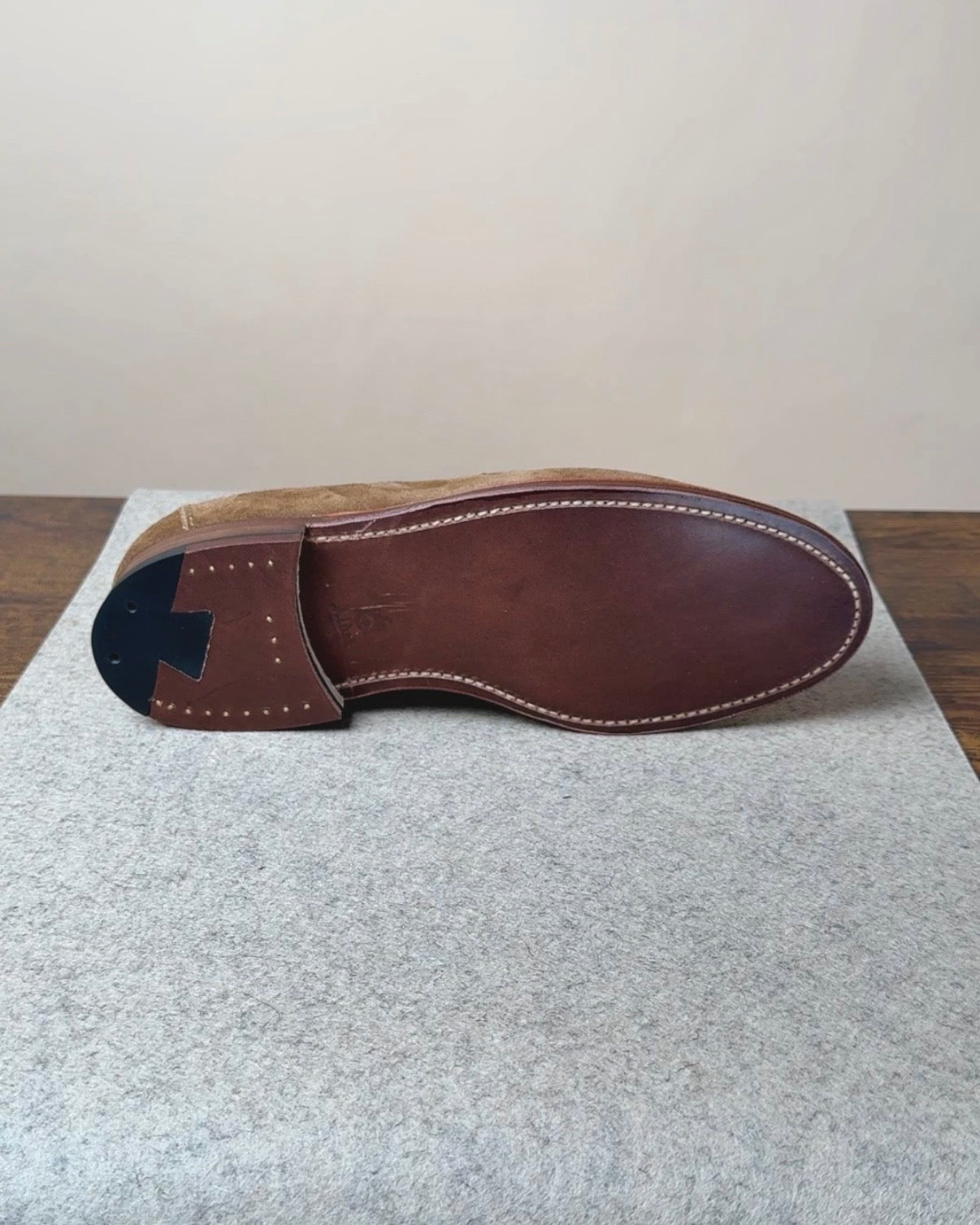 Alden Copley Penny Loafer in snuff suede footwear with classic slip-on design and dark rubber sole, close-up view.