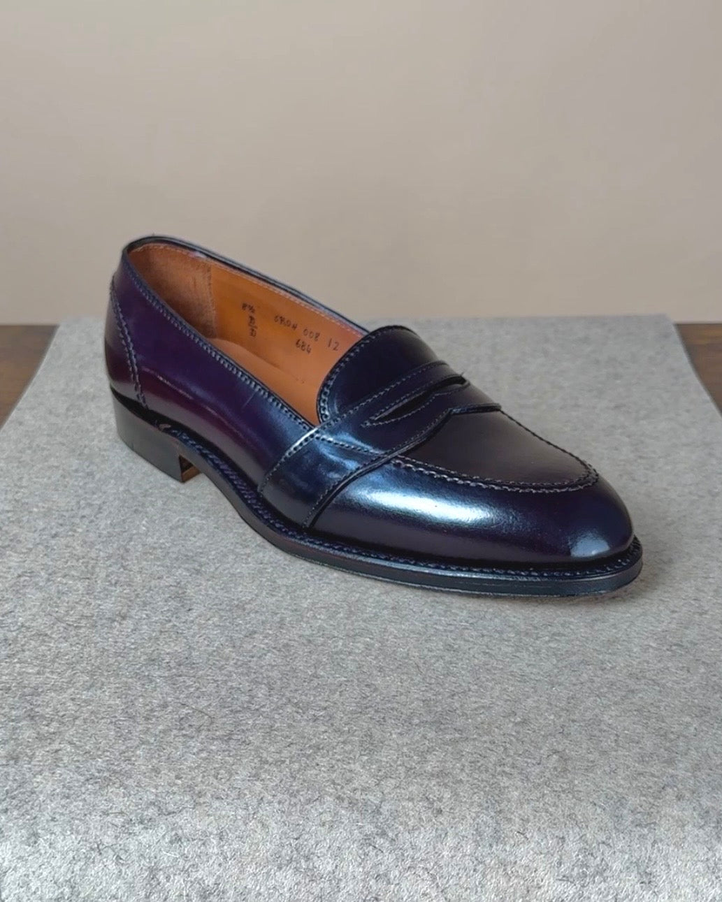 Alden full strap penny loafer in Color 8 Shell Cordovan leather, showing the classic slip-on footwear with smooth polished finish.