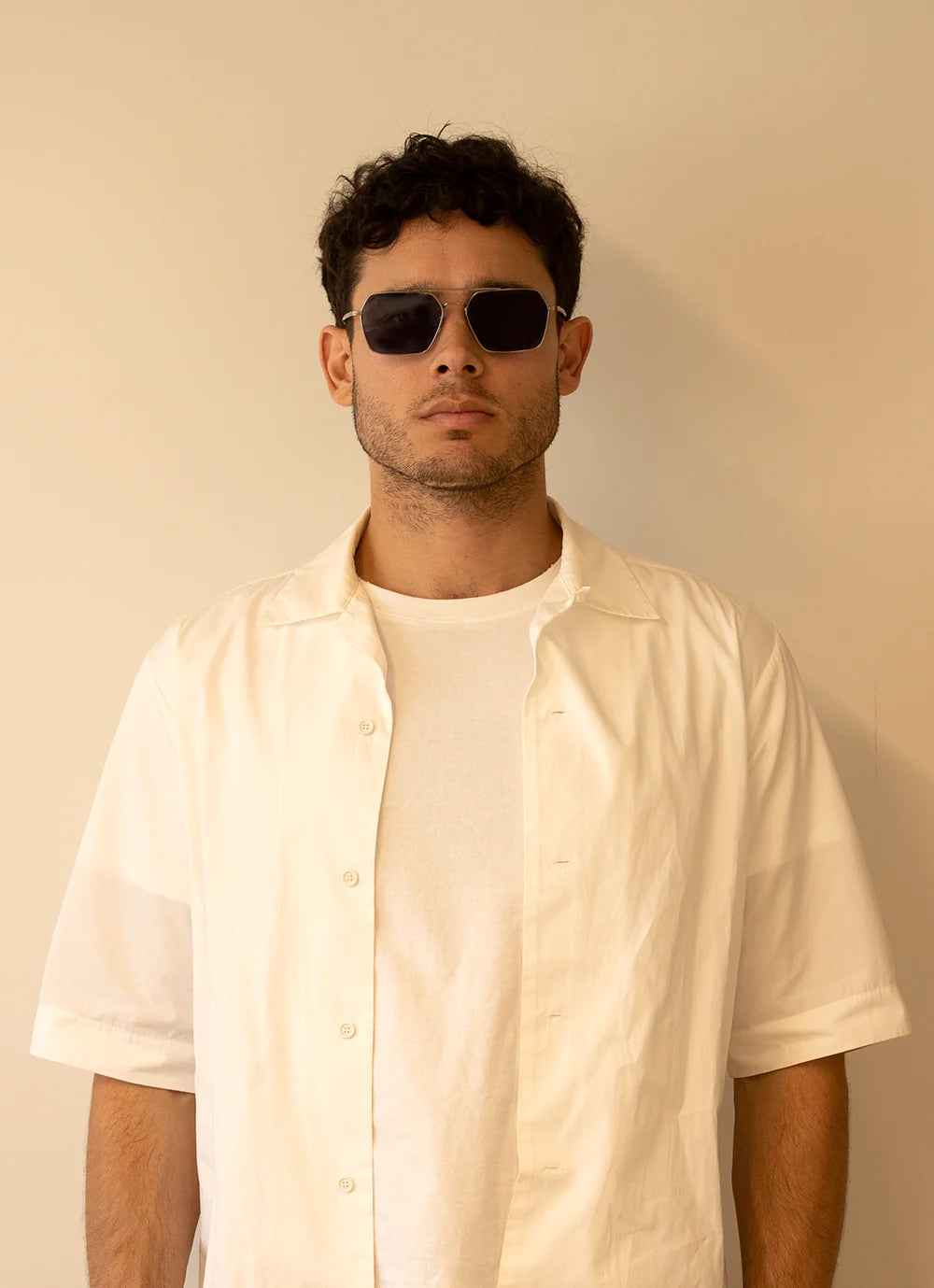 Garrett Leight Alta sunglasses in antique gold with semi-flat auburn gradient lenses and stylish frame design.