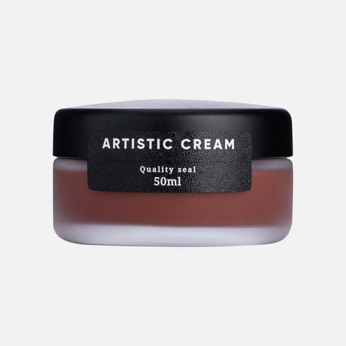 Paul Brunngård Artistic Cream shoe care product in mahogany color, showing the cream in a jar with a brush applicator.