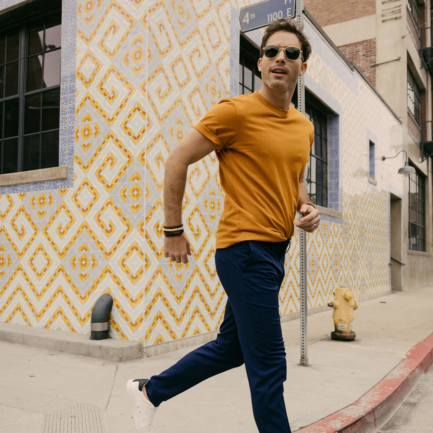 Randolph USA 23K gold and cobalt aviator accessories displayed in a lifestyle setting, showcasing elegant design and craftsmanship.
