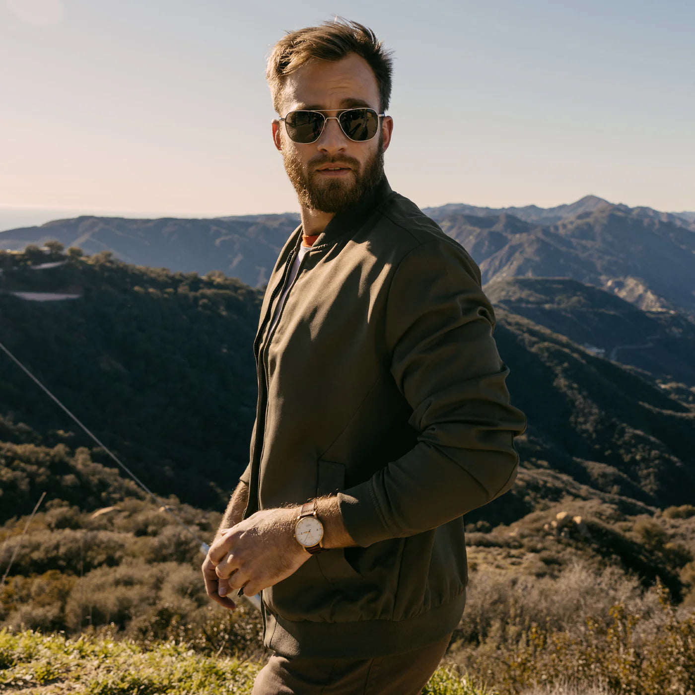 Randolph USA Aviator accessories with matte chrome finish, shown in a lifestyle setting highlighting the sleek, universal design.