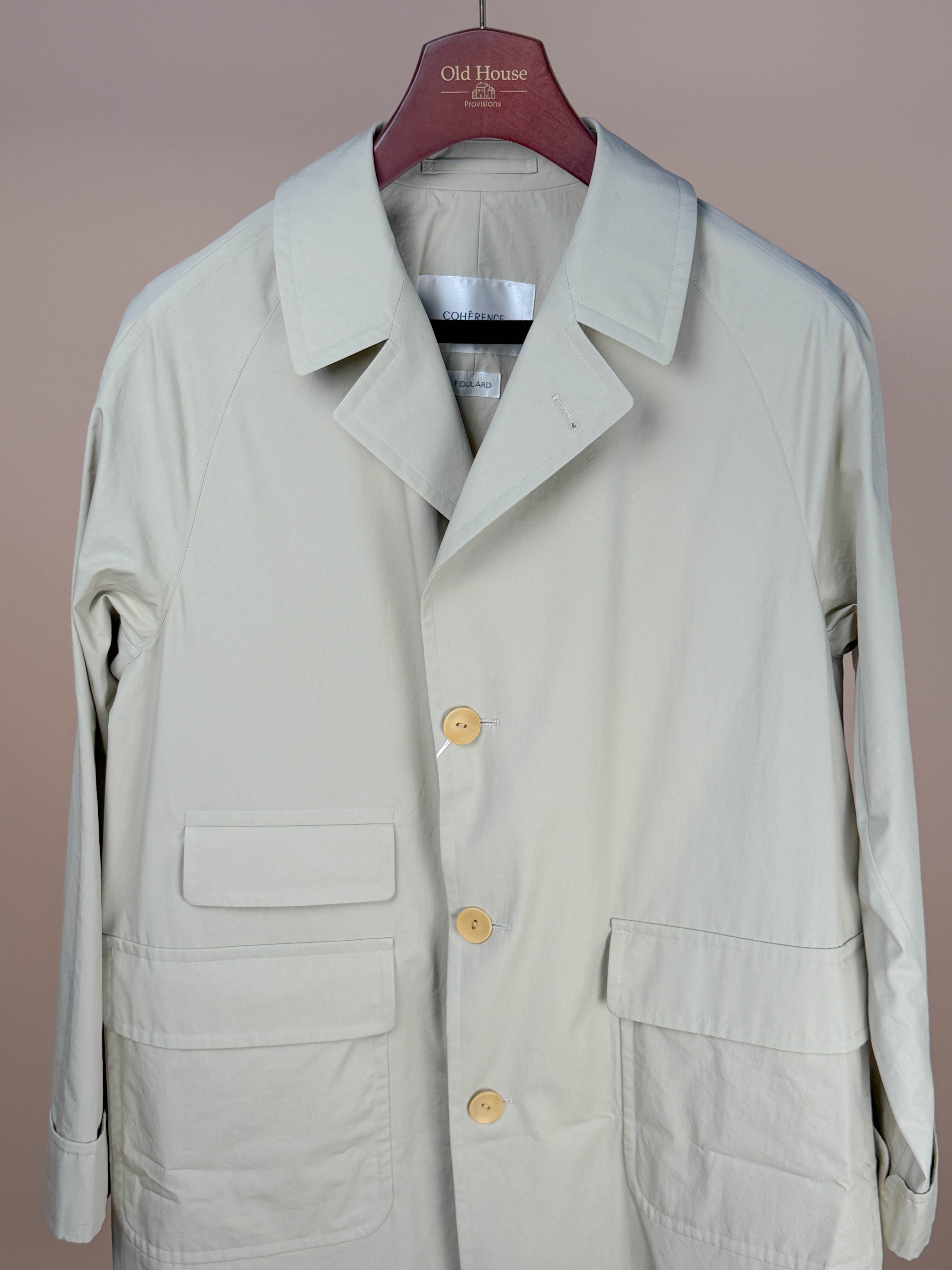 Cohérence CORB II light weather-resistant cotton clothing in sand color, showing a close-up of the fabric and design details.