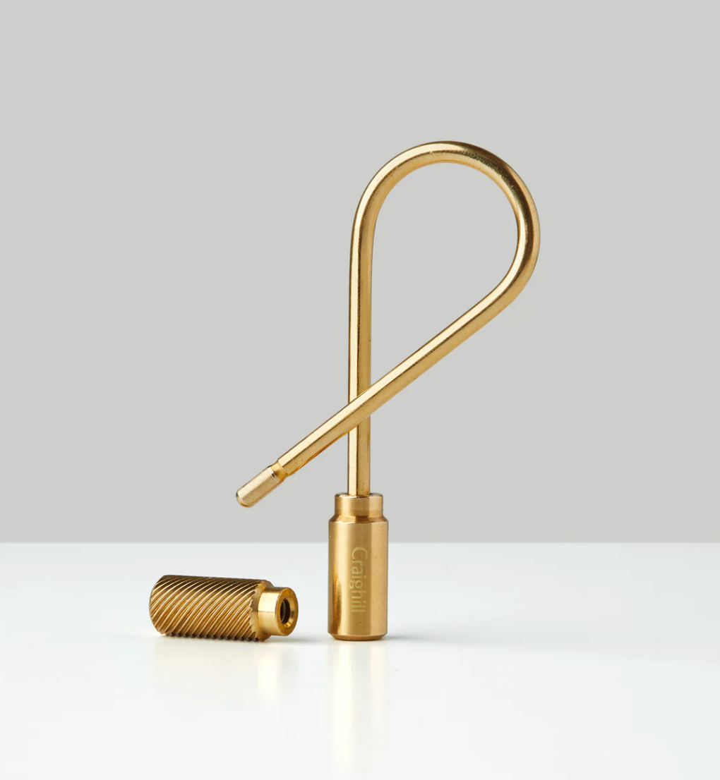 Brass closed helix keyring by Craighill, a sleek and durable accessory for organizing keys with a modern design.