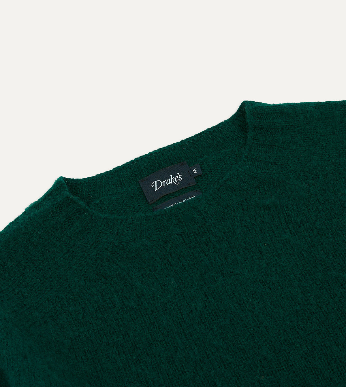 Drake's brushed Shetland wool crewneck sweater in forest green, showcasing a cozy, textured knit design.