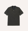 Drake's washed black pique cotton polo shirt, casual clothing with a classic collar and short sleeves, displayed on a white background.