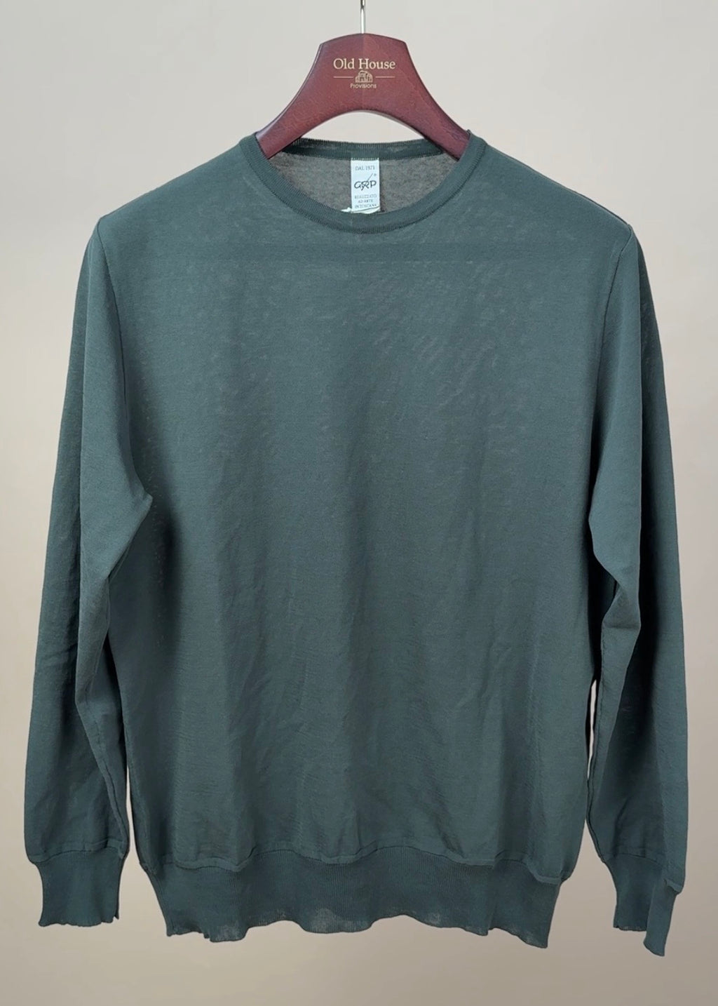 Olive green Gassed Cotton long sleeve knitted shirt by GRP, displayed flat showing the textured fabric and classic collar style.