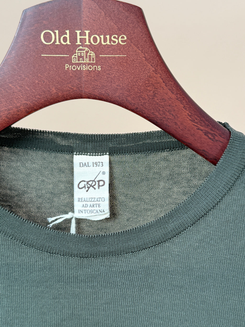 Olive green Gassed Cotton long sleeve knitted shirt by GRP, showcasing a cozy, fitted knit top with ribbed cuffs and collar.