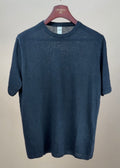 Black linen knitted T-shirt by GRP, featuring a soft, textured fabric with a relaxed fit and classic crew neckline.