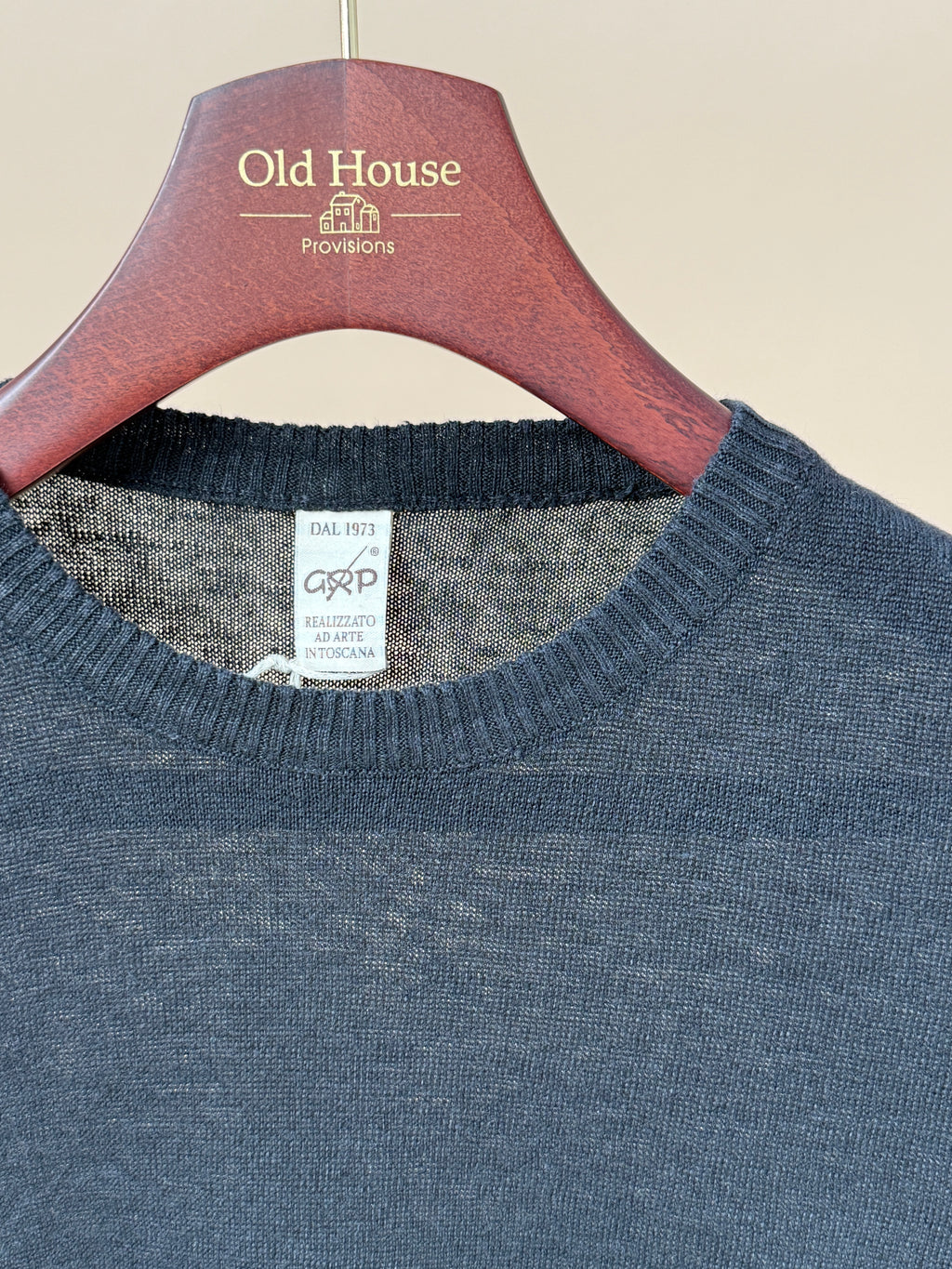 Black linen knitted T-shirt by GRP, showcasing a comfortable, casual clothing style with detailed knit texture.
