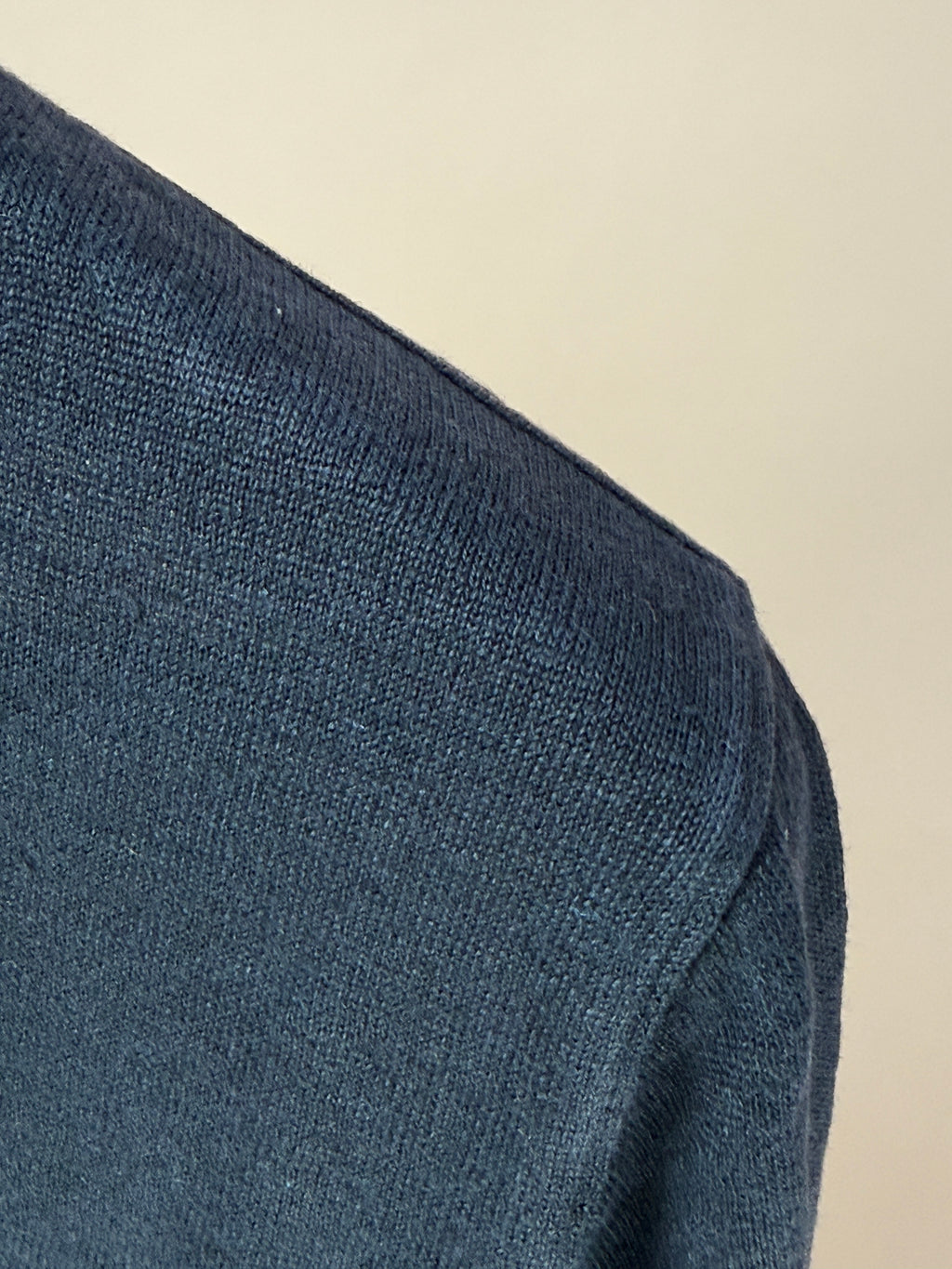 Black linen knitted T-shirt by GRP, showing a close-up of the soft, textured fabric and classic fit.