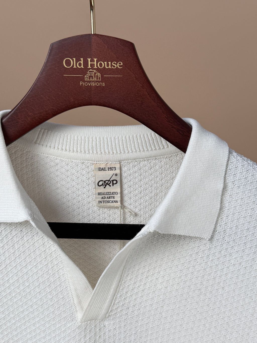 Ecru Neo Polo shirt from GRP, casual clothing with a classic fit, shown on a model against a plain background.