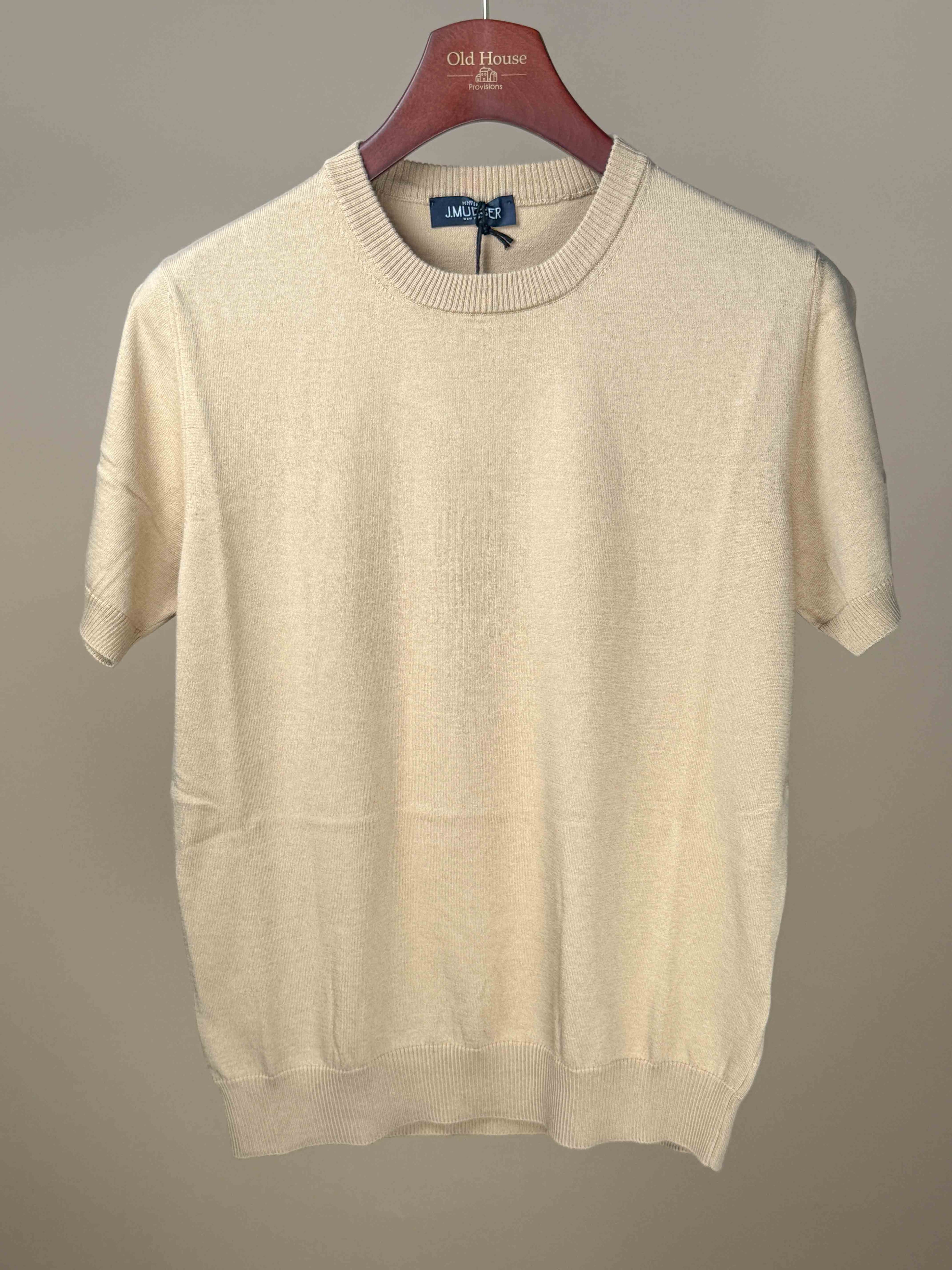 Tan knitted cotton T-shirt by J.Mueser, featuring a comfortable fit and casual style, displayed on a plain background.