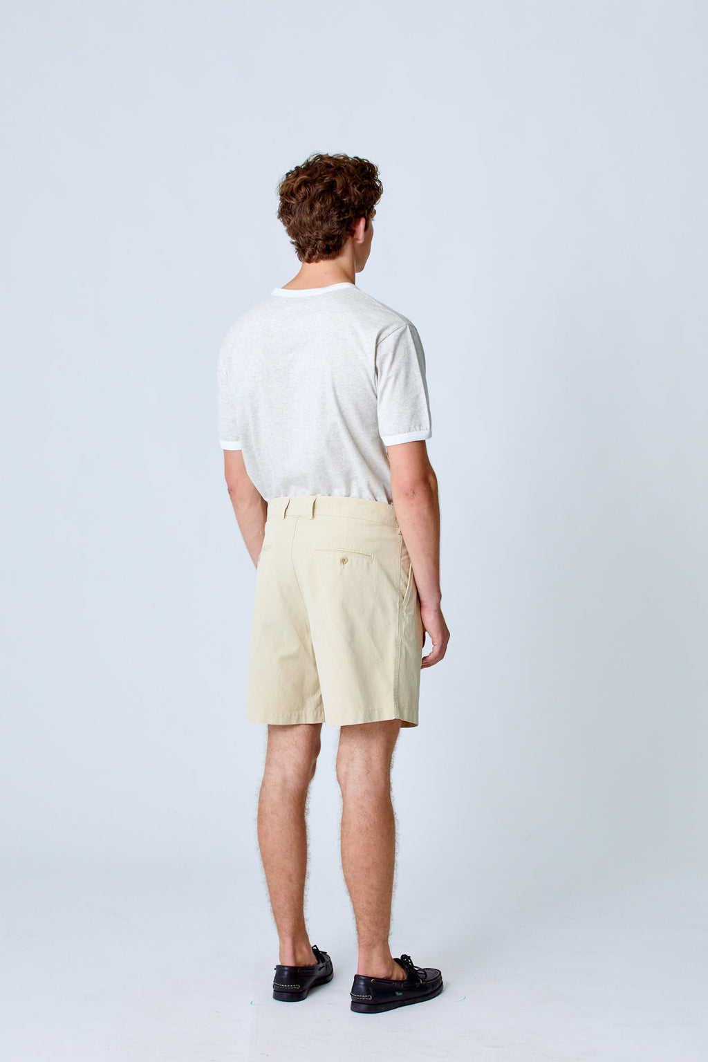 Cream Lapa Canvas Pleated Shorts by La Paz, featuring a relaxed fit and pleated design, shown in a casual clothing setting.