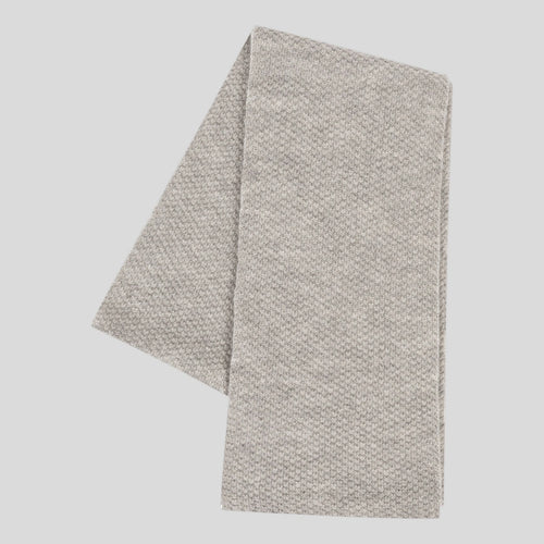 John Smedley 7G British wool scarf in natural color, showcasing soft, cozy wool accessory with a smooth texture and versatile style.