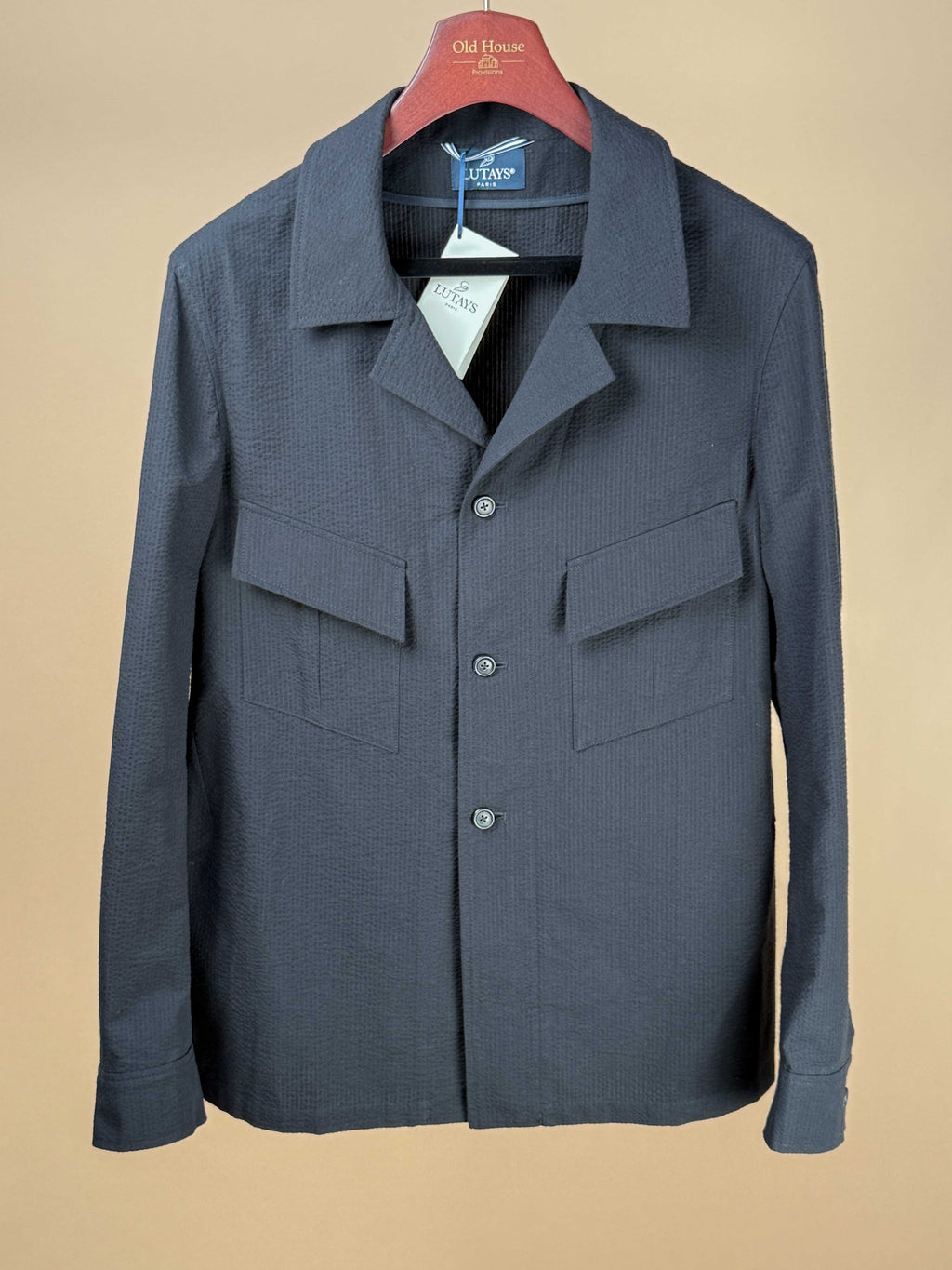 Black Lutays Boutet jacket made from seer sucker fabric, featuring a tailored fit and classic style.