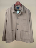 Lutays Zola beige wool mohair hopsack unlined jacket displayed on a hanger, showcasing its tailored fit and textured fabric.