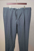 Rota brown pleated dress trousers made from 2-ply wool, showcasing a tailored fit and classic design in a natural fold.