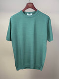 Olive Ice Cotton Knitted T-Shirt by MoonCastle, close-up of soft, textured fabric and casual fit on a mannequin.