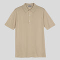 John Smedley Sea Island Cotton Polo in almond color, showcasing a close-up of the soft, high-quality cotton fabric and classic collar.