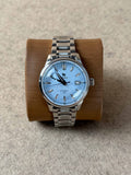 NUMA Living Waters Watch, a stylish accessory with a sleek design, featuring a round dial and durable strap.