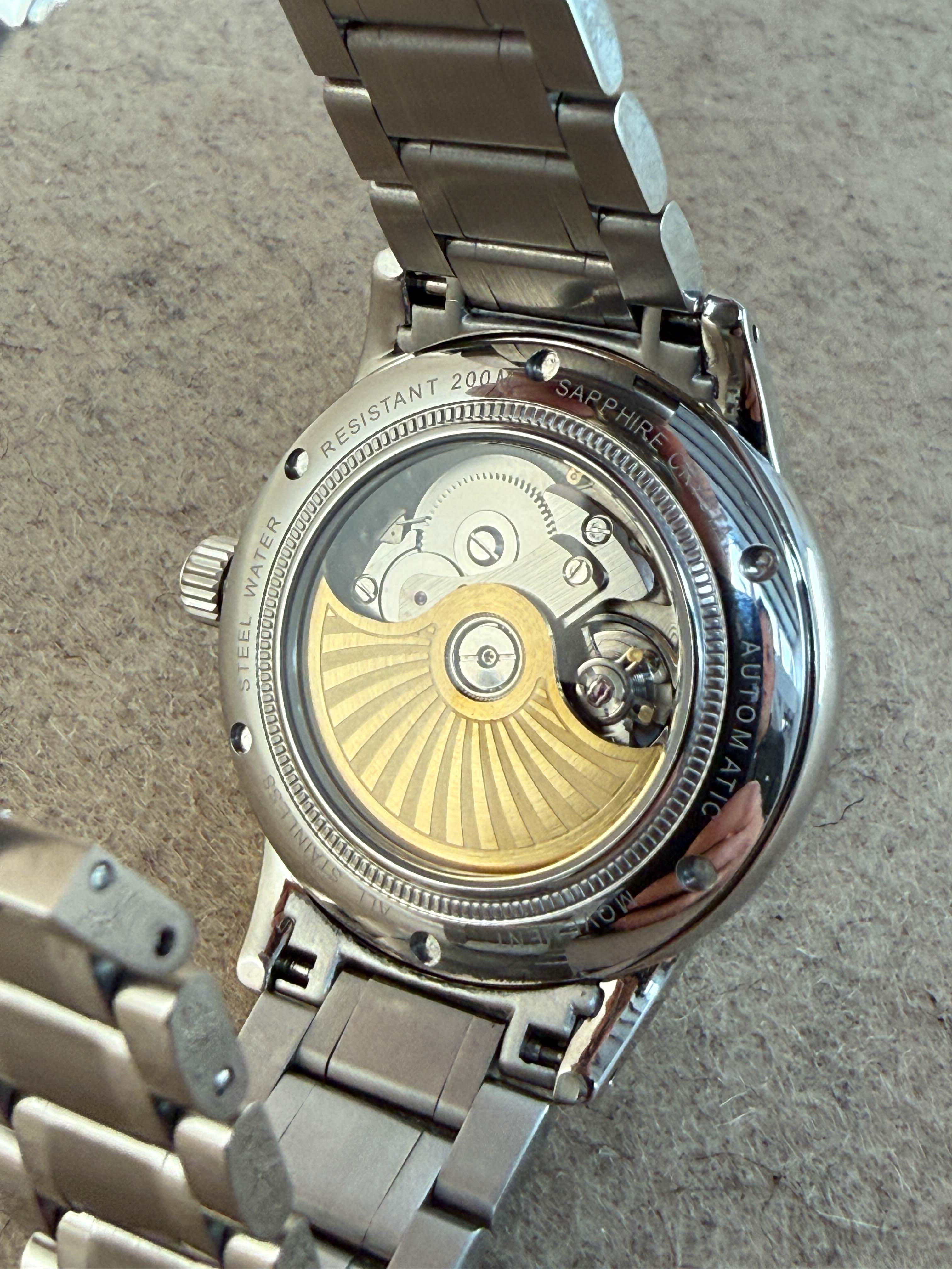 NUMA Living Waters watch, a stylish accessory with a sleek design and durable strap, showcasing a modern timepiece.