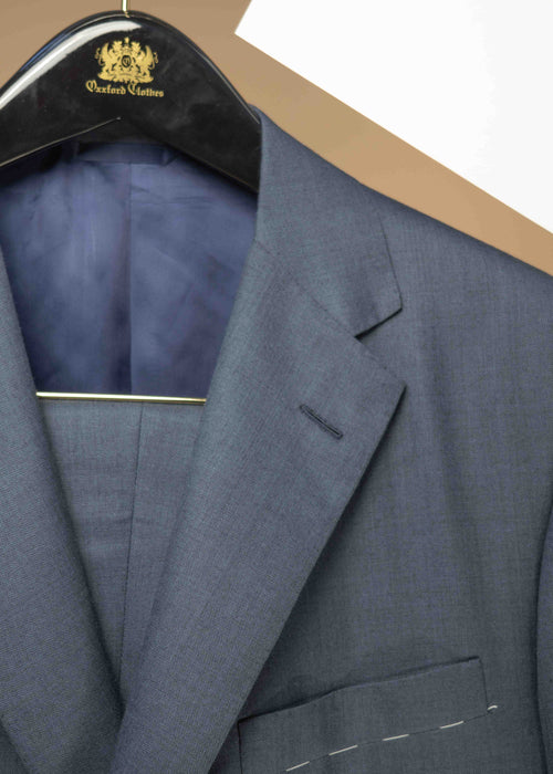 Oxxford Archer Sharkskin Suit in Slate Blue, tailored men's clothing with a sleek, textured fabric and classic fit.