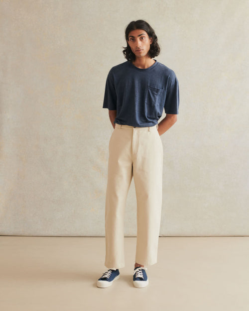 Cream Balloon Trousers made of heavy cotton drill by De Bonne Facture, featuring a relaxed fit and structured design.