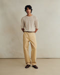 De Bonne Facture balloon trousers in heavy cotton drill with a butter color, featuring a relaxed fit and casual style.