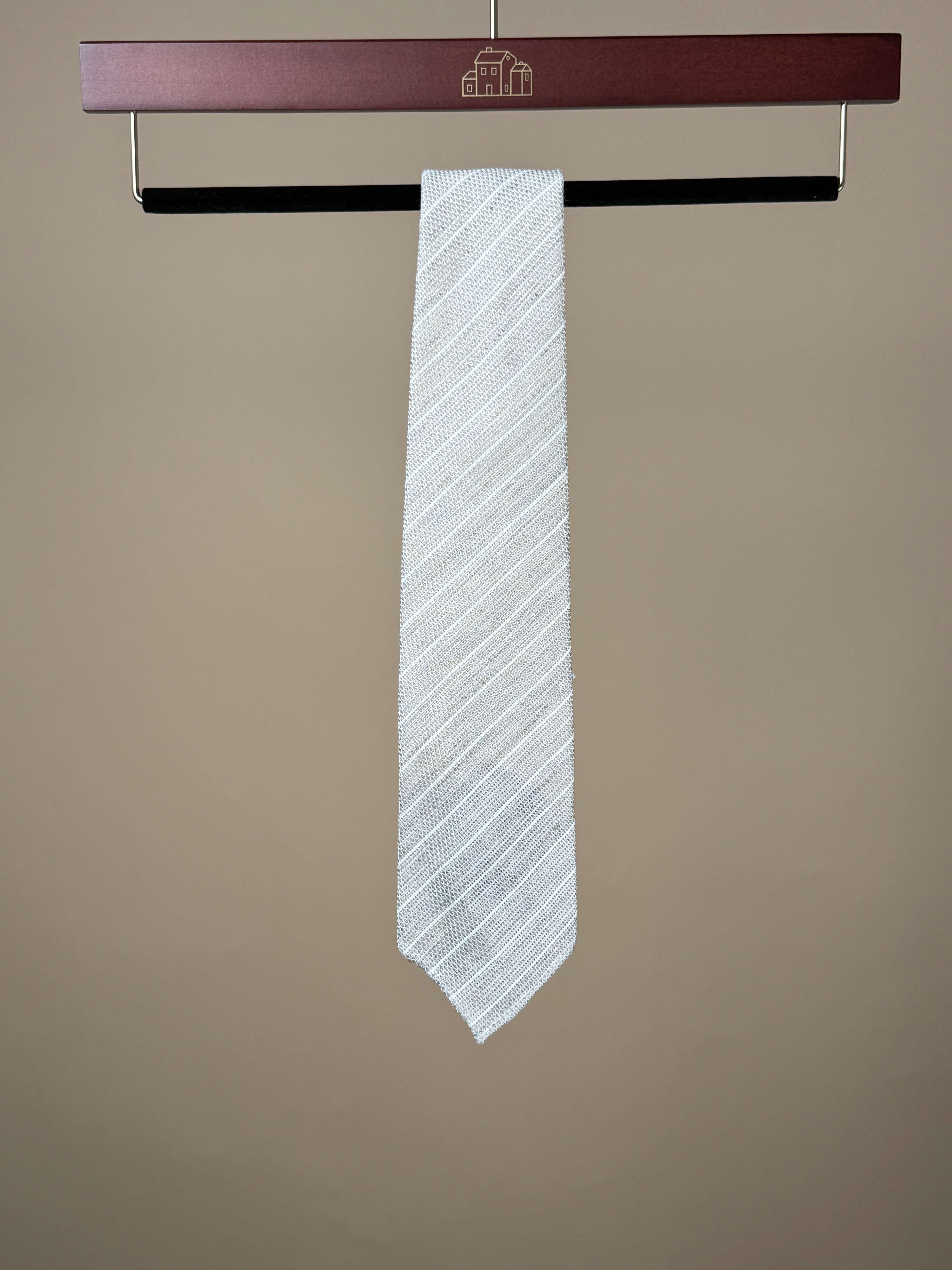 Beige stripe knitted silk untipped tie by Paolo Albizzati, showing its textured pattern and classic accessory style.