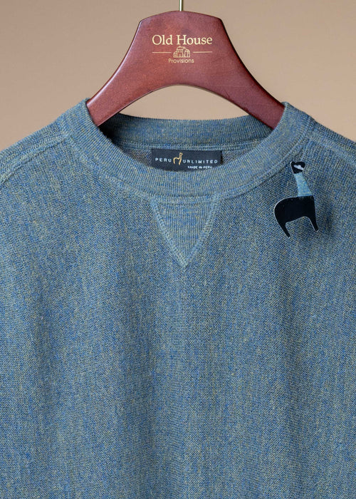 Baby Alpaca Link Sweatshirt in Bluegrass Heather from Peru Unlimited, showing a close-up of the soft, textured fabric and neckline.