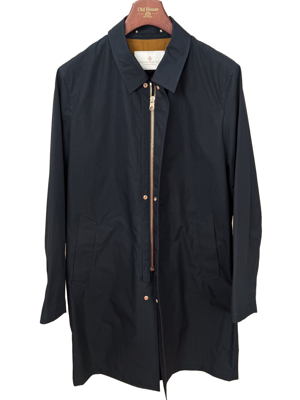Private White V.C. Jack's Mac Raincoat in Ink, a stylish waterproof clothing piece with a classic design and button details.