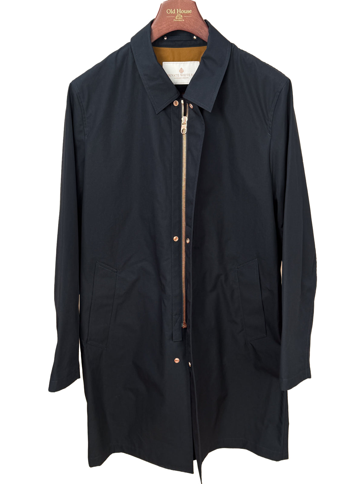 Private White V.C. Jack's Mac Raincoat in Ink, a stylish waterproof clothing piece with a classic design and button details.