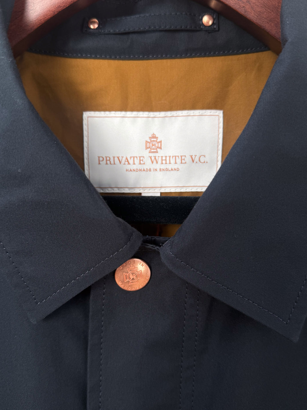 Private White V.C. Jack's Mac Raincoat in ink color, stylish waterproof clothing with a classic design and durable fabric.