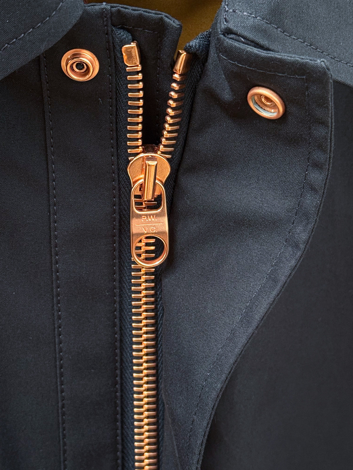 Private White V.C. Jack's Mac Raincoat in Ink, stylish waterproof clothing with a classic design and durable fabric.