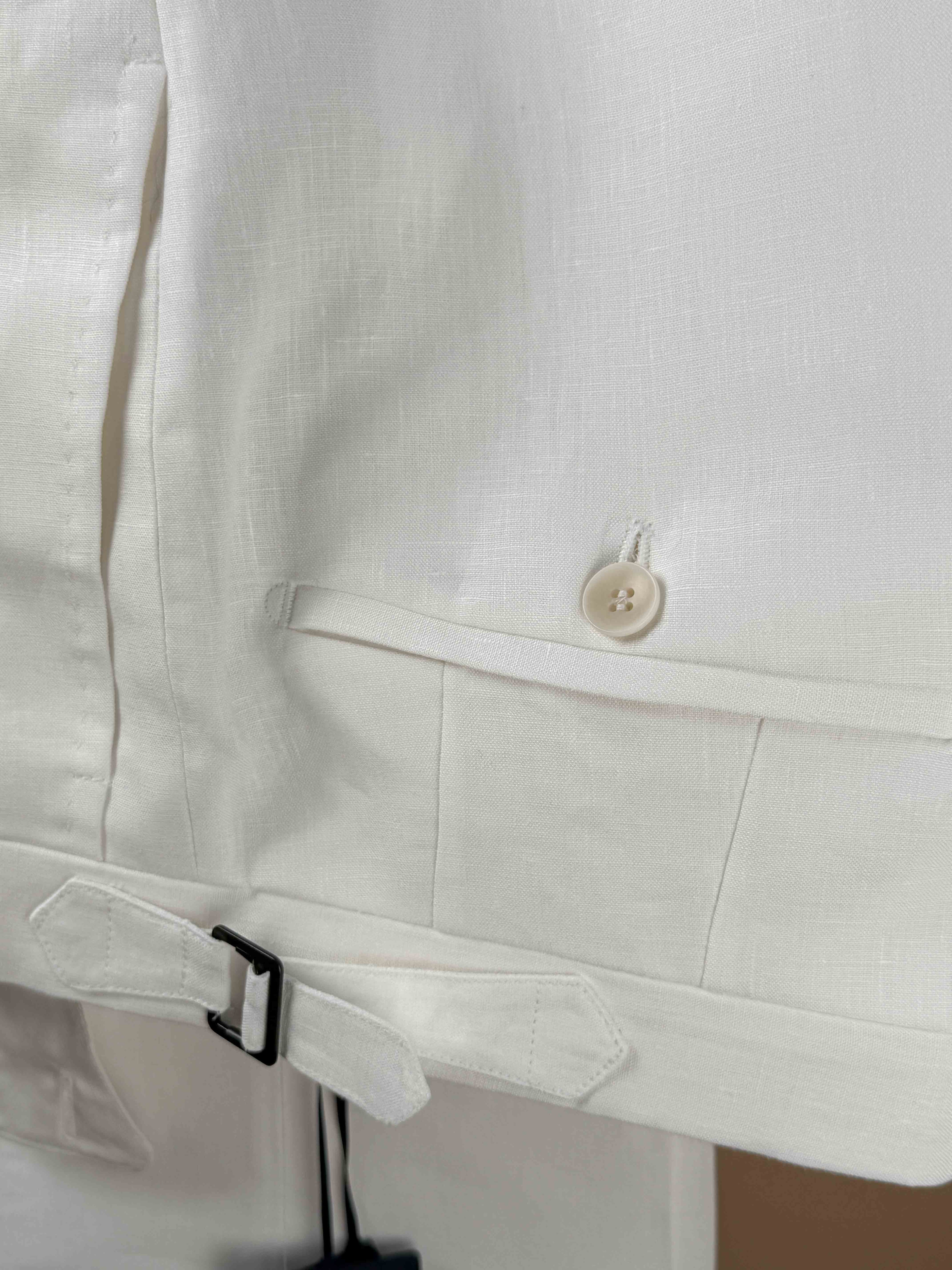 White linen pleated dress trousers by Rota, featuring a tailored fit and classic design, ideal for casual or formal wear.