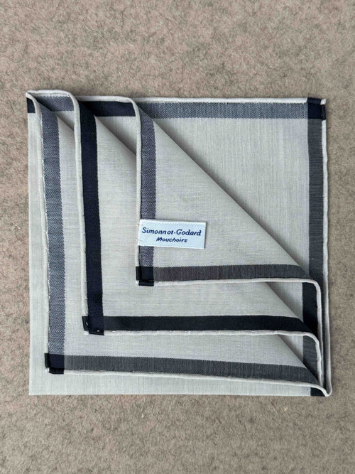 Simonnot-Godard Amalfi cotton pocket square in ivory and black with a stylish pattern, perfect for adding elegance to accessories.