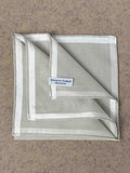 Simonnot-Godard Amalfi cotton pocket square in ivory and white, showcasing elegant accessory with classic pattern and soft fabric.