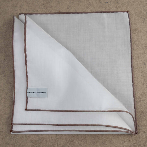 Brown Atrani pocket square by Simonnot-Godard, showcasing elegant silk fabric and classic accessory styling.